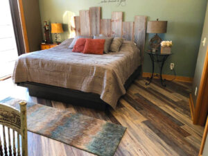 Luxurious wood-look laminate flooring in a trendy bedroom